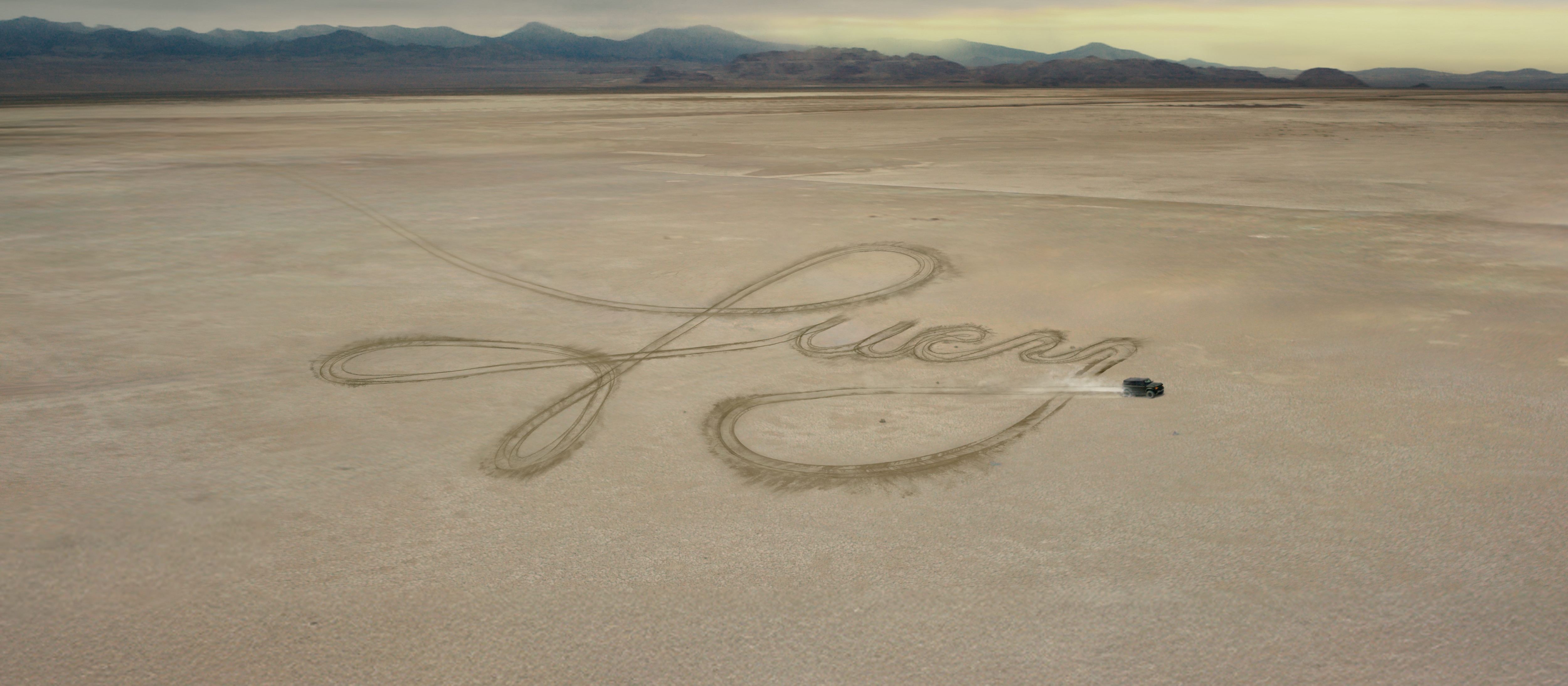 The word "Lucy" spelled out by tires in the Great Salt Lake Desert.